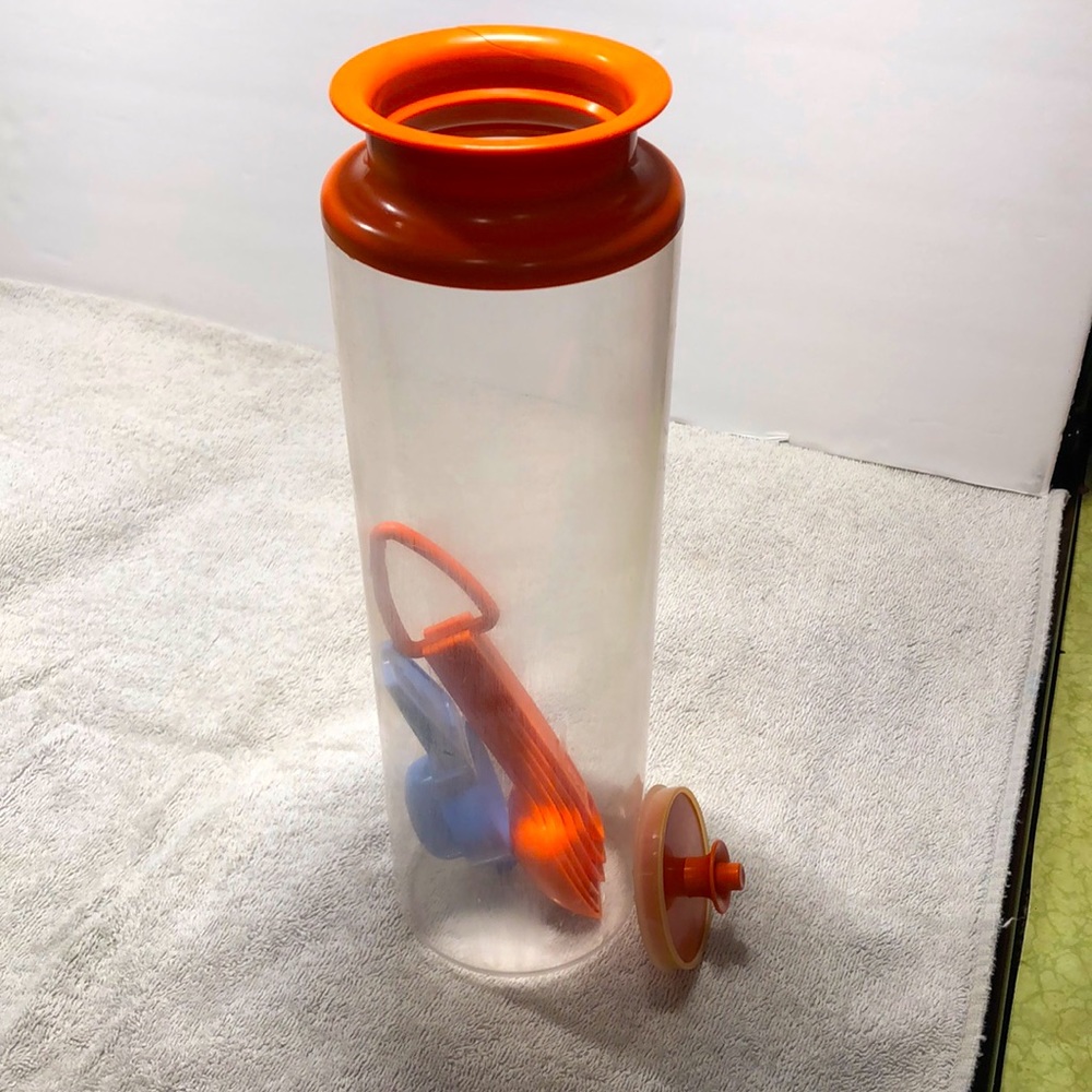 Bundle of 3 Tupperware Product. Pasta Container,Egg Separator, Measuring Spoons.